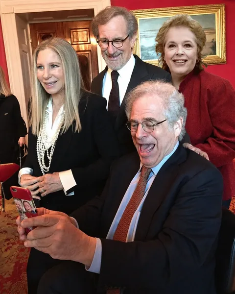 Andrea Sims with Barbra Streisand and entertainment luminaries Andrea Sims with Barbra Streisand, Steven Spielberg, and Itzhak Perlman