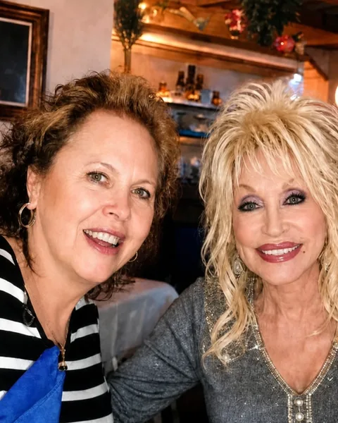 Andrea Sims with Dolly Parton Andrea Sims with Dolly Parton