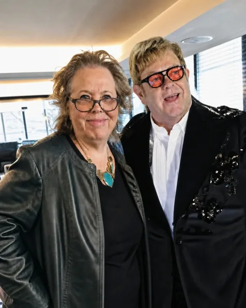 Andrea Sims with Sir Elton John Andrea Sims with Sir Elton John